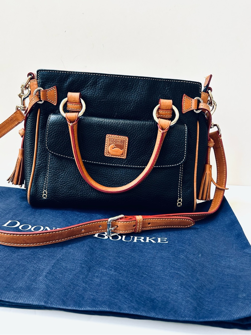 Dooney & Bourke Black Leather Satchel with Tan Trim